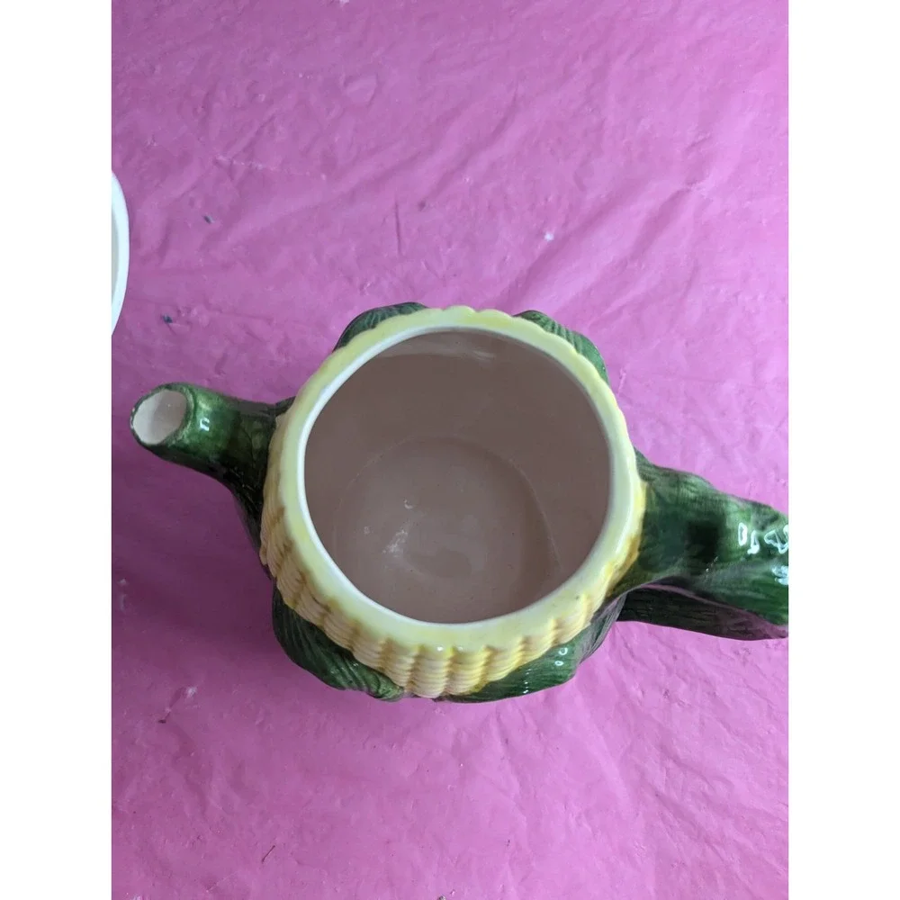 Corn husk teapot with lady bug beetle‎ ? at top  7.5